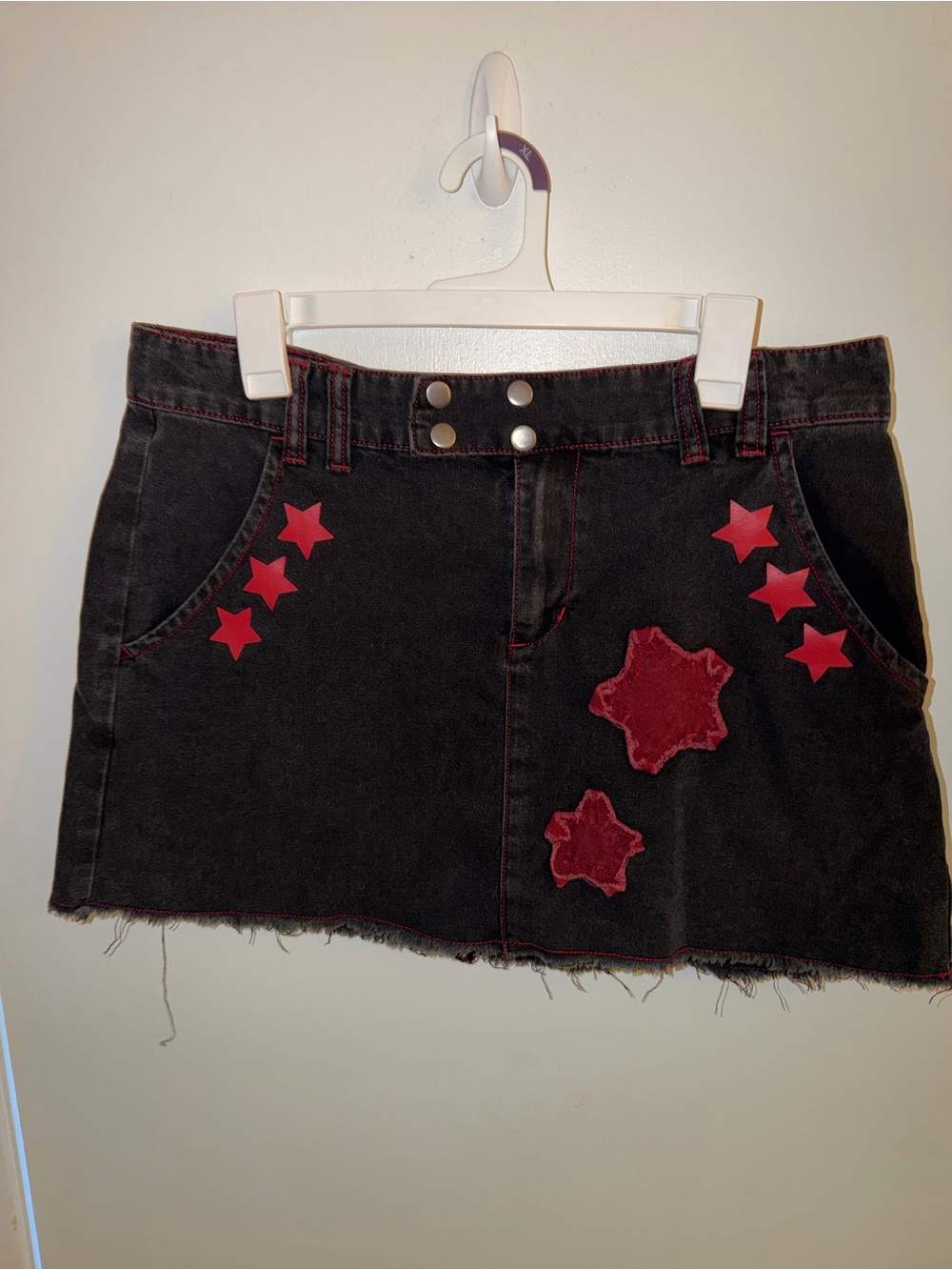 Black Denim Mini Skirt with Red Star Appliquรฉs